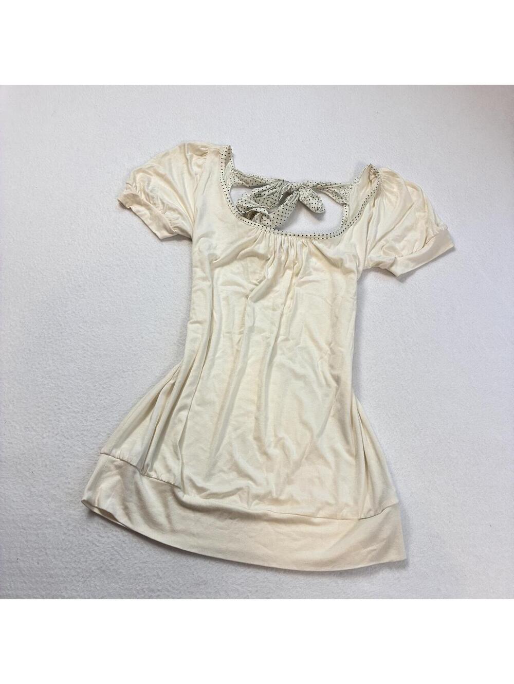 Twentyone off white flowy scoop neck top with polka dot tie in back! Size small